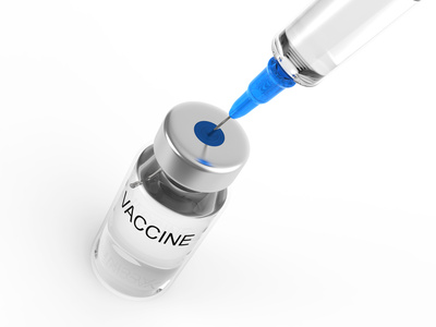 Needle in a glass bottle labeled vaccine