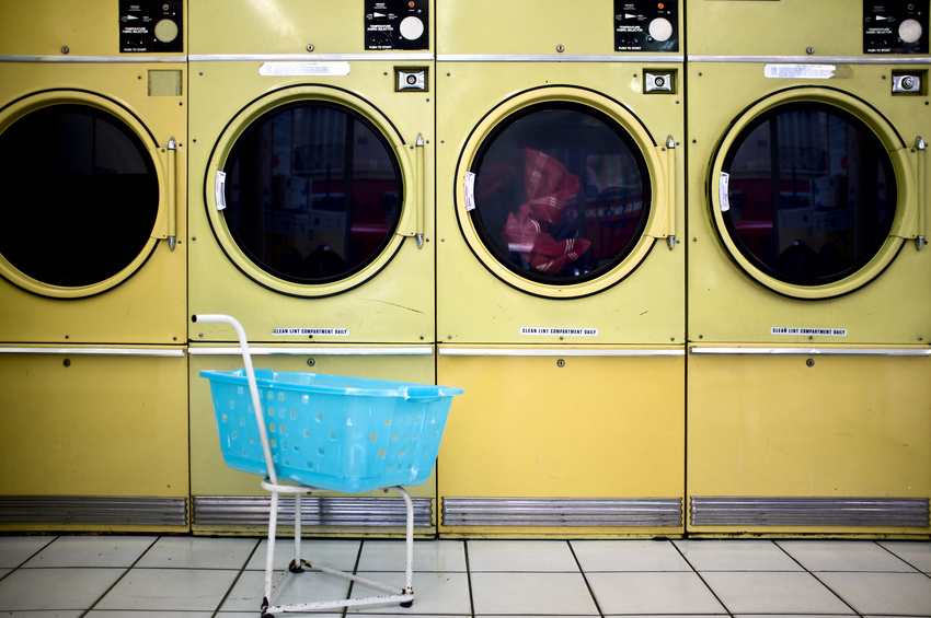yellow laundry machines in laundrette