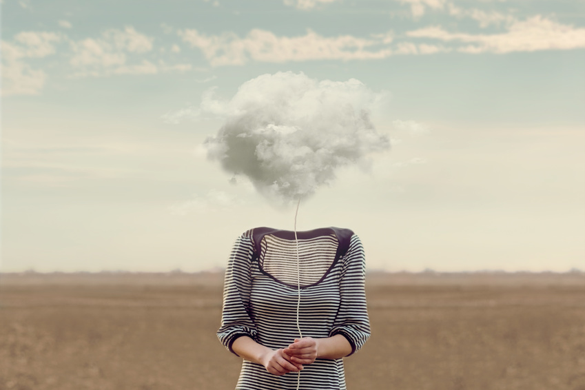 Woman's head hidden by a soft cloud